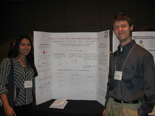 Dan S. and Lisa M. and their poster